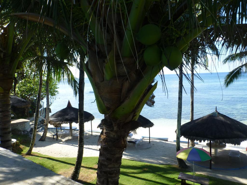 Reddoorz Premium @ Flower Beach Anda Анда Экстерьер фото