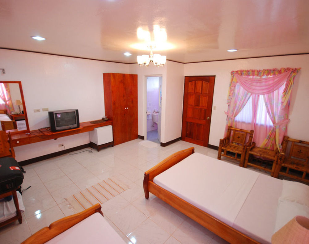 Reddoorz Premium @ Flower Beach Anda Анда Экстерьер фото