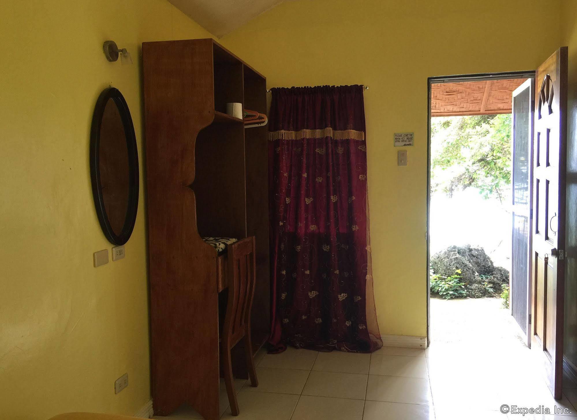 Reddoorz Premium @ Flower Beach Anda Анда Экстерьер фото