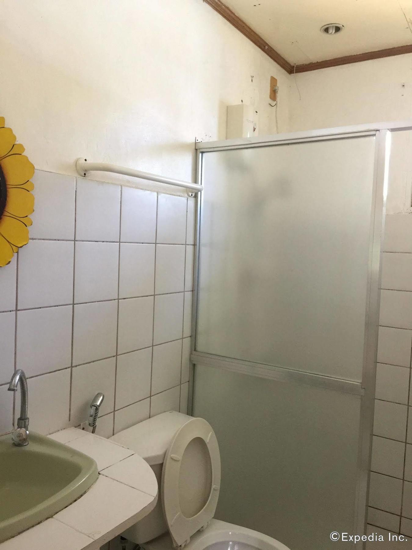 Reddoorz Premium @ Flower Beach Anda Анда Экстерьер фото