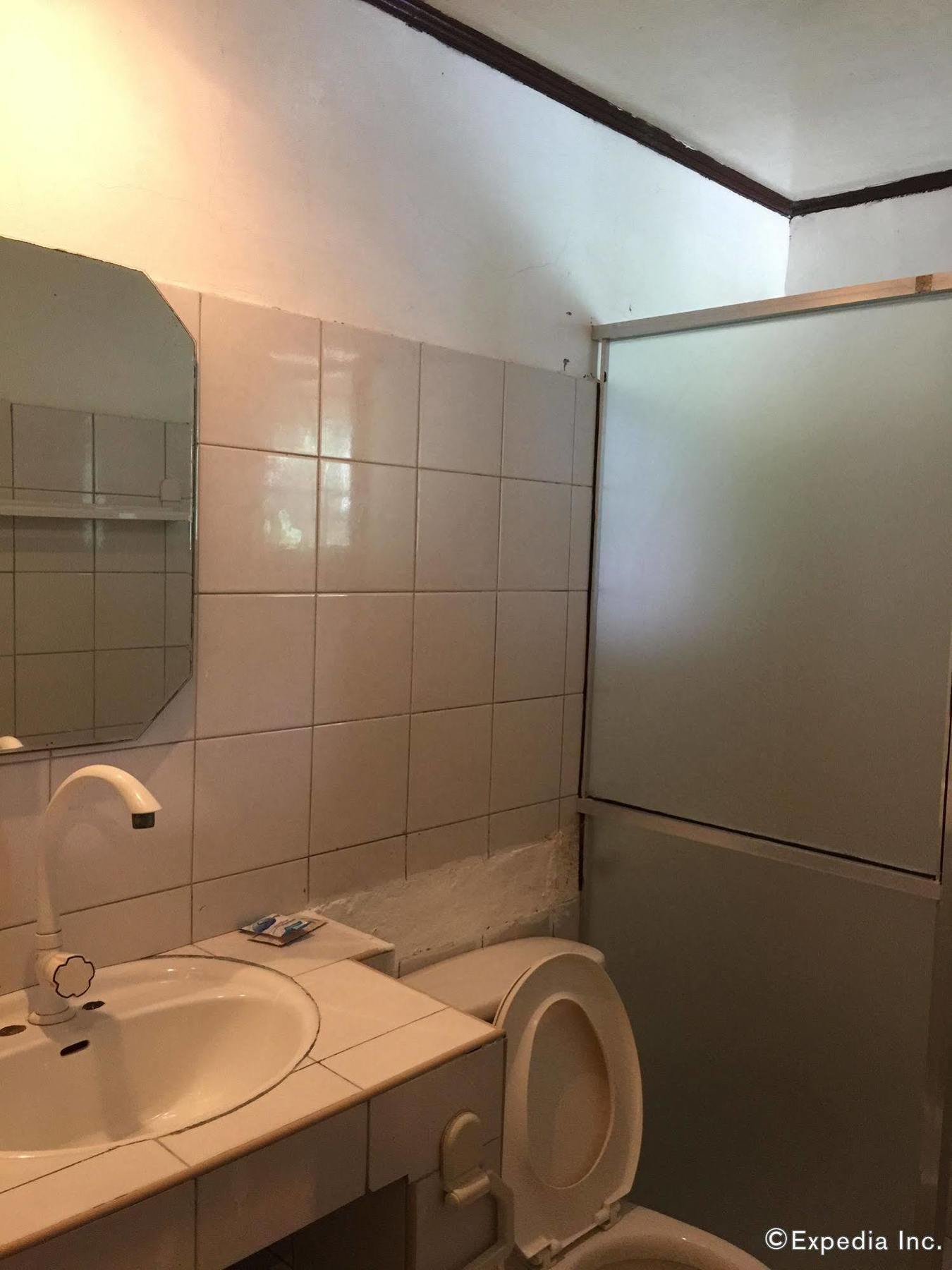 Reddoorz Premium @ Flower Beach Anda Анда Экстерьер фото
