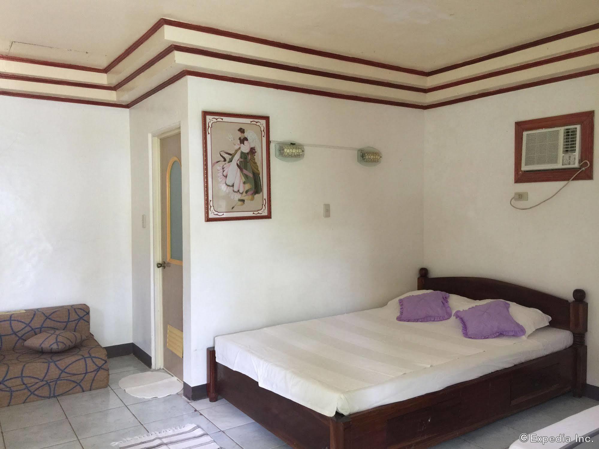 Reddoorz Premium @ Flower Beach Anda Анда Экстерьер фото